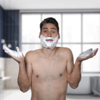 Man with shaving foam